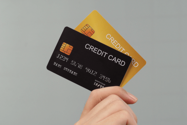 A man weighs the pros and cons of credit cards